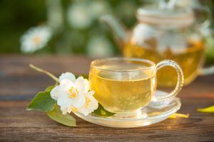 delicious green tea in a beautiful glass bowl on a table