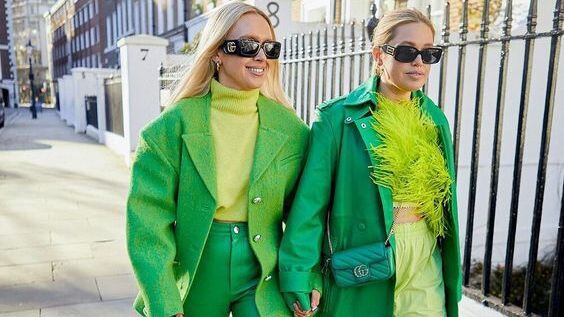 Monochrome fashion trend. London Fashion Sisters Olivia & Alice in All Green