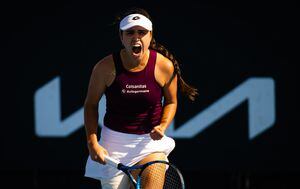 MELBOURNE, AUSTRALIA - JANUARY 16: Camila Osorio of Colombia in action against Panna Udvardy of Hungary during her first round match on Day 1 of the 2023 Australian Open at Melbourne Park on January 16, 2023 in Melbourne, Australia. (Photo by Robert Prange/Getty Images)