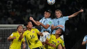 Spain's Olaya Enriqu, center, heads the ball during the FIFA U-17 Women's World Cup final soccer match between Spain and Colombia in Navi Mumbai, India, Sunday, Oct. 30, 2022. (AP Photo/Rafiq Maqbool)