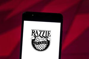GLóRIA DE DOURADOS, MATO GROSSO DO SUL, BRAZIL - 2019/06/19: In this photo illustration the Golden Raspberry Awards (Razzie Awards) logo is seen displayed on a smartphone. (Photo by Rafael Henrique/SOPA Images/LightRocket via Getty Images)