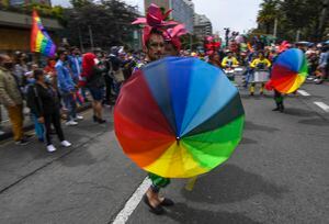 Member's of the LGBTIQ community take part in the Pride Parade in Bogota, on July 4, 2021. (Photo by Juan BARRETO / AFP)