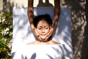 Woman tropical massage facial beauty treatment