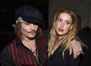 LOS ANGELES, CA - FEBRUARY 15:  Actor/musician Johnny Depp (L) and actress Amber Heard attend The 58th GRAMMY Awards at Staples Center on February 15, 2016 in Los Angeles, California.  (Photo by John Shearer/WireImage)