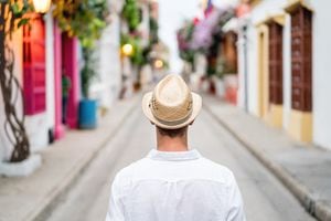 Casual male tourist sightseeing in Cartagena - people traveling concepts