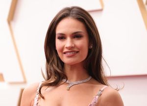 HOLLYWOOD, CALIFORNIA - MARCH 27: Lily James attends the 94th Annual Academy Awards at Hollywood and Highland on March 27, 2022 in Hollywood, California. (Photo by Momodu Mansaray/Getty Images)