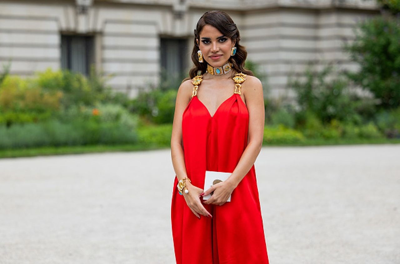 PARIS, FRANCE - JULY 03: Camila Coelho is seen wearing red jump suit, necklace outside Schiaparelli during the Haute Couture Fall/Winter 2023/2024 as part of  Paris Fashion Week on July 03, 2023 in Paris, France. (Photo by Christian Vierig/Getty Images)