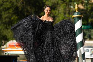 VENICE, ITALY - SEPTEMBER 07: Patricia Gloria Contreras wears a black tulle with black sequins embroidered pattern shoulder-off / corset long dress, during the 78th Venice International Film Festival on September 07, 2021 in Venice, Italy. (Photo by Edward Berthelot/Getty Images)