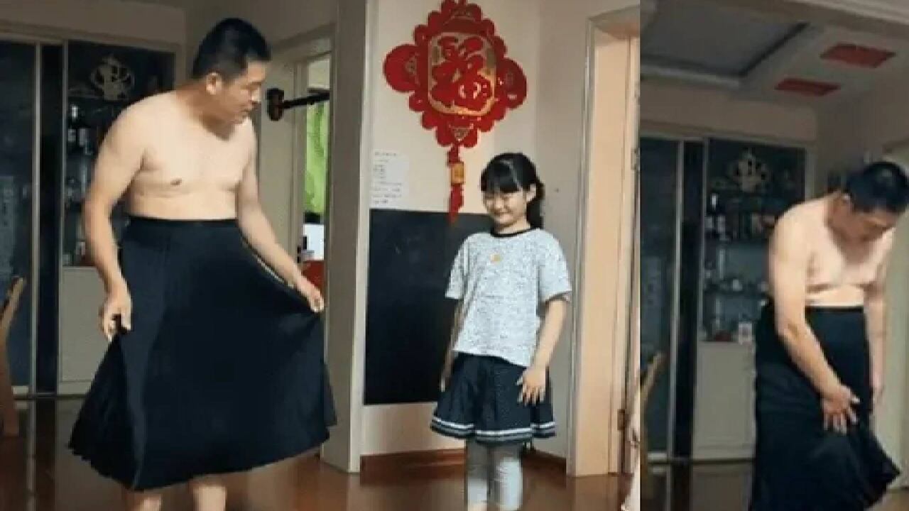 Hombre enseña a sus hijas a vestir falda