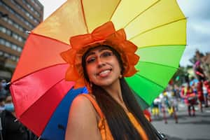 Member's of the LGBTIQ community take part in the Pride Parade in Bogota, on July 4, 2021. (Photo by Juan BARRETO / AFP)