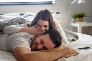 Love couple in bed in the morning