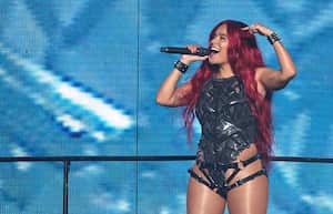 LAS VEGAS, NEVADA - OCTOBER 14: Recording artist Karol G performs during a stop of her $trip Love tour at T-Mobile Arena on October 14, 2022 in Las Vegas, Nevada. (Photo by Ethan Miller/Getty Images)