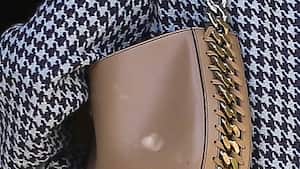 PARIS, FRANCE - OCTOBER 04: Fashion designer Stella McCartney, handbag detail, is seen leaving the Ritz hotel on October 04, 2021 in Paris, France. (Photo by Marc Piasecki/GC Images)