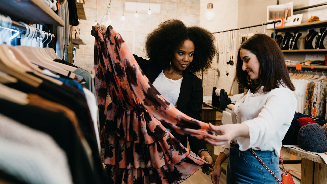 Friends going shopping together in a small shop.