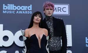 LAS VEGAS, NEVADA - MAY 15:  Megan Fox (L) and Machine Gun Kelly attend the 2022 Billboard Music Awards at MGM Grand Garden Arena on May 15, 2022 in Las Vegas, Nevada. (Photo by Mindy Small/FilmMagic)