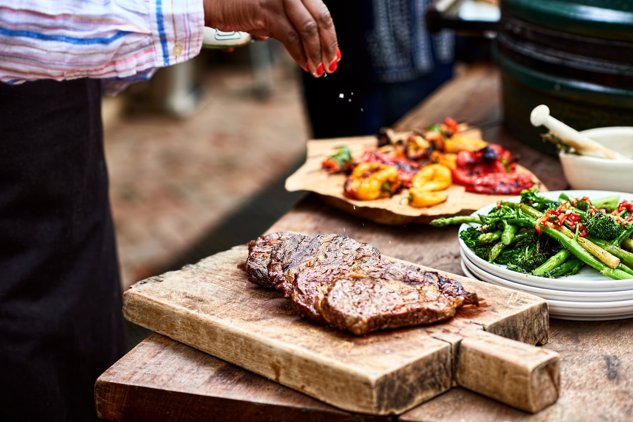 Seasoning meat ready for dinner, to serve with a side of green vegetables, food preparation, healthy eating