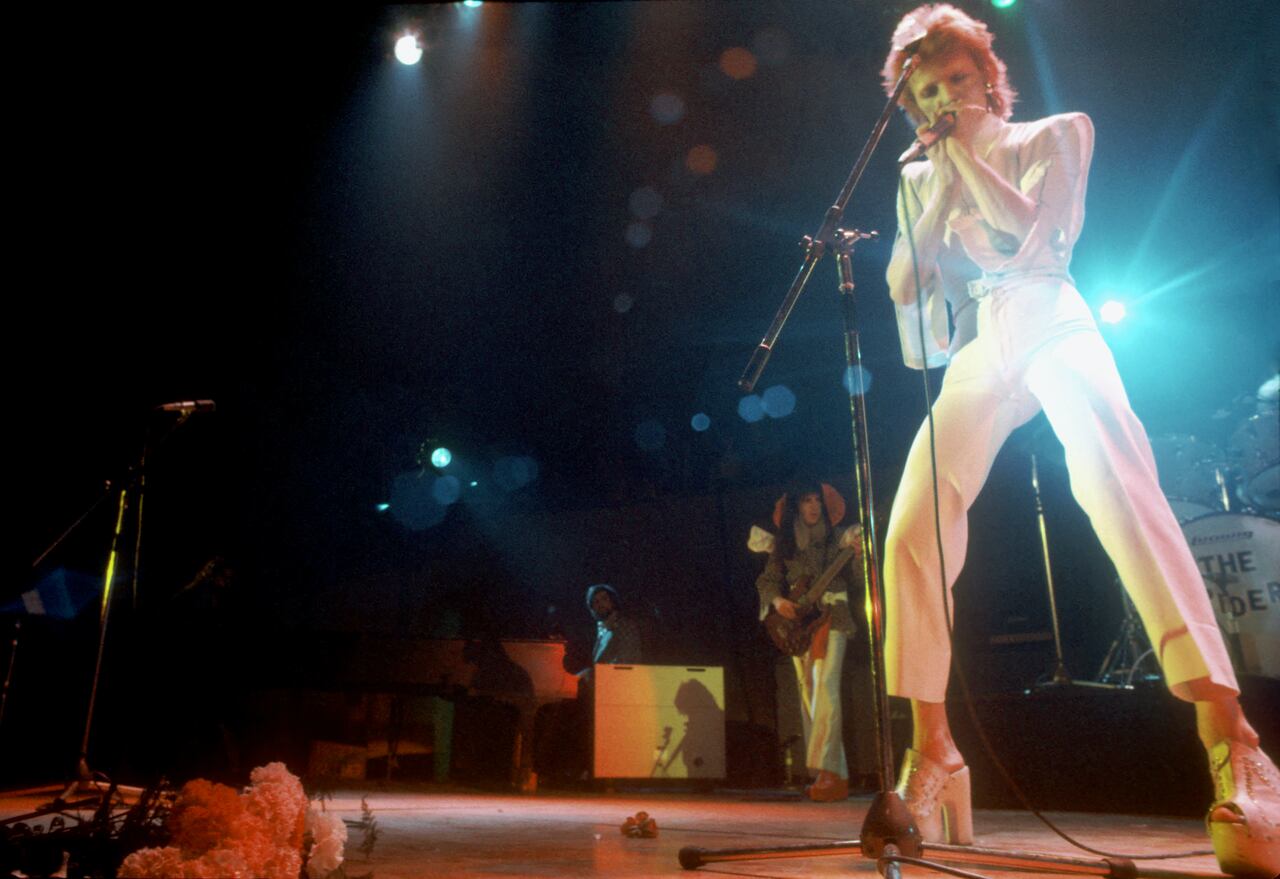 Musician David Bowie performs onstage during his "Ziggy Stardust" era in 1973
