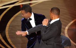 El momento justo en que Will Smith golpea al presentador. Al principio se pensó que era parte del guión.