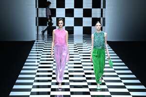 MILAN, ITALY - FEBRUARY 24: Models walk the runway at the Emporio Armani fashion show during the Milan Fashion Week Fall/Winter 2022/2023 on February 24, 2022 in Milan, Italy. (Photo by Daniele Venturelli/WireImage)