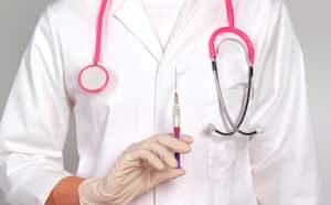 Doctor giving a contraceptive injection