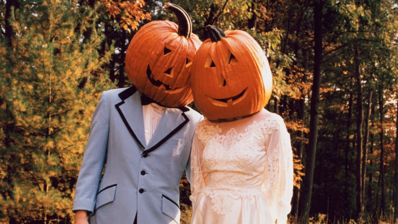 Couple with Pumpkin Heads