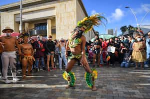 Member's of the LGBTIQ community take part in the Pride Parade at Bolivar square in Bogota, on July 4, 2021. (Photo by Juan BARRETO / AFP)