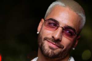 MIAMI, FLORIDA - DECEMBER 03: Maluma, wearing CHANEL, attends the Chanel Dinner To Celebrate Five Echoes By Es Devlin, Jungle Plaza, Miami Design District on December 03, 2021 in Miami, Florida. (Photo by Sean Zanni/Patrick McMullan via Getty Images)