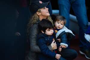 BARCELONA, SPAIN - NOVEMBER 28: Shakira carries her children Milan and Sasha ahead of the La Liga match between FC Barcelona and Real Sociedad de Futbol at Camp Nou on November 28, 2015 in Barcelona, Spain. (Photo by David Ramos/Getty Images)