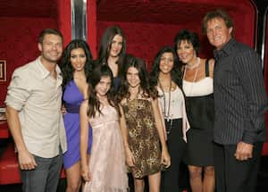 AGOURA HILLS, CA - OCTOBER 16:  Ryan Seacrest, Kim Kardashian, Kylie Jenner, Khloe Kardashian, Kendall Jenner, Kourtney Kardashian, Kris Jenner and Bruce Jenner pose for a photo at the "Keeping Up With the Kardashians" viewing party at Chapter 8 Restaurant on October 16, 2007 in Agoura Hills, California.  (Photo by Jeff Vespa/WireImage)