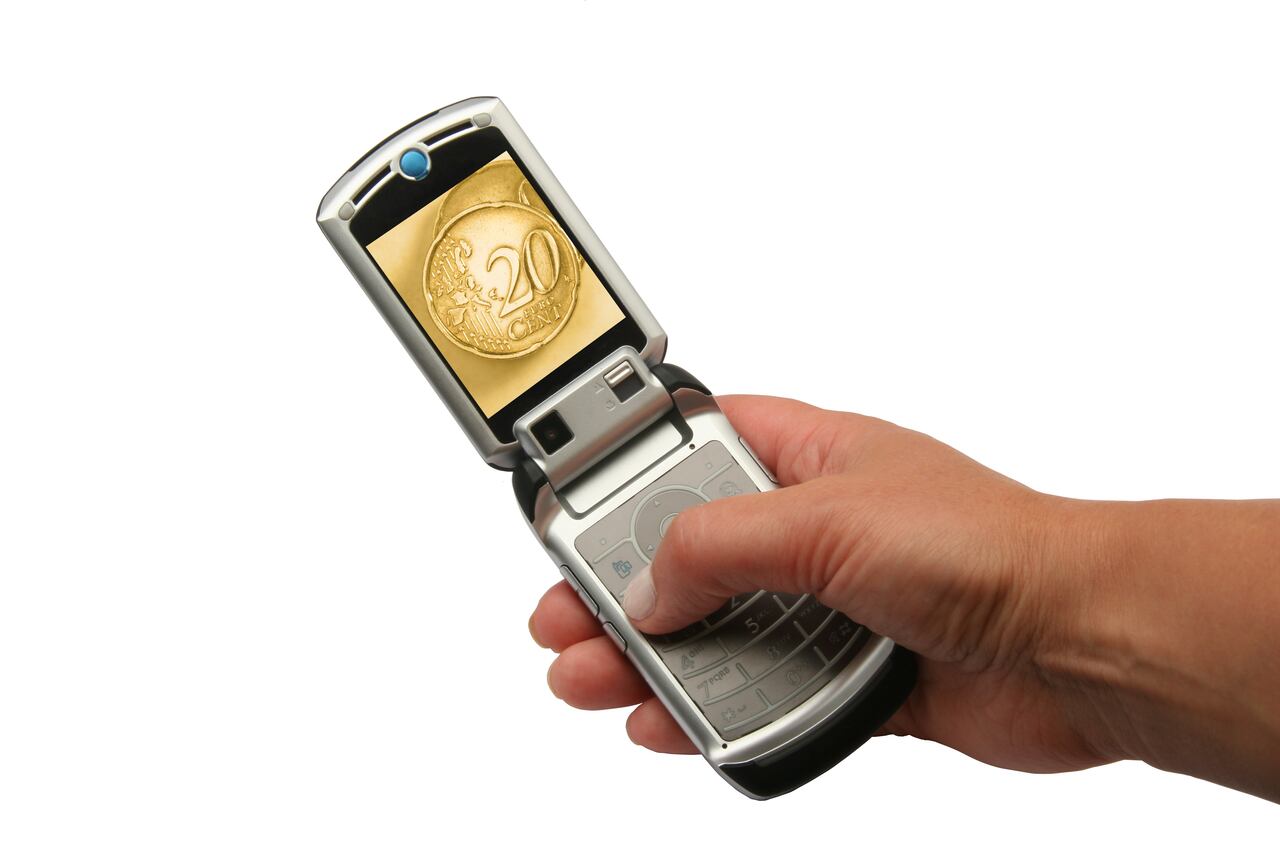 Mobile phone whith 20 cents of euro coins