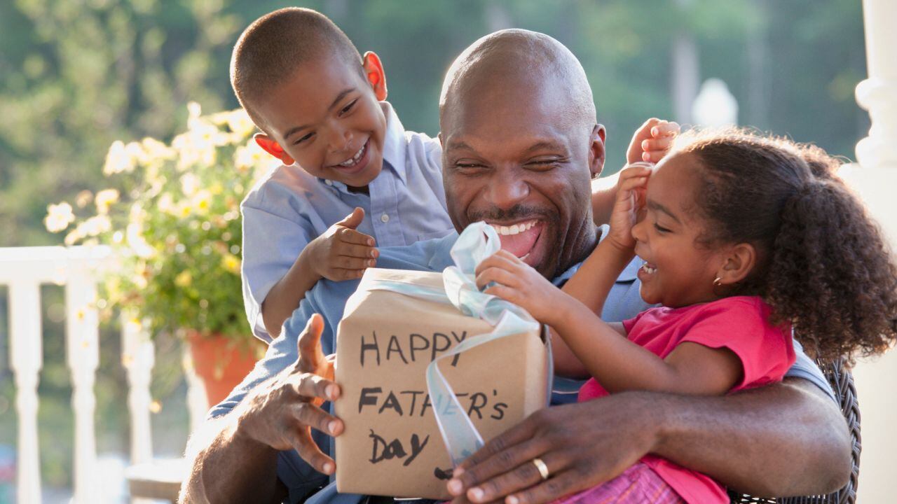 Padre e hijos en le Día del Padre.