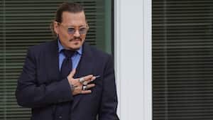FAIRFAX, VIRGINIA - MAY 27: Actor Johnny Depp takes a break during his trial at a Fairfax County Courthouse on May 27, 2022 in Fairfax, Virginia. Closing arguments in the Depp v. Heard defamation trial, brought by Johnny Depp against his ex-wife Amber Heard, begins today. (Photo by Kevin Dietsch/Getty Images)