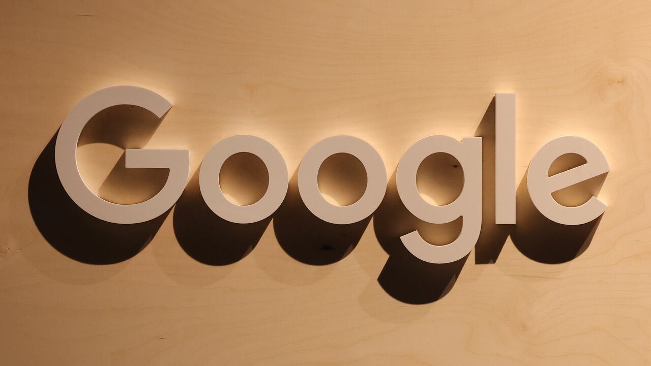 BERLIN, GERMANY - JUNE 09: A participant walks past a Google logo at a stand at the 2022 Re:publica digital society festival on June 09, 2022 in Berlin, Germany. The three-day event brings together stakeholders and leading voices from a wide spectrum of today's global, digital society. Photo by Sean Gallup/Getty Images)