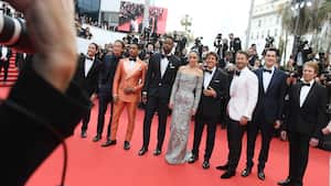 CANNES, FRANCE - MAY 18: (L-R) Danny Ramirez, Lewis Pullman, Greg Tarzan Davis, Jay Ellis, Jennifer Connelly, Tom Cruise, Glen Powell, Joseph Kosinski and Jerry Bruckheimer attend the screening of "Top Gun: Maverick" during the 75th annual Cannes film festival at Palais des Festivals on May 18, 2022 in Cannes, France. (Photo by Joe Maher/Getty Images)