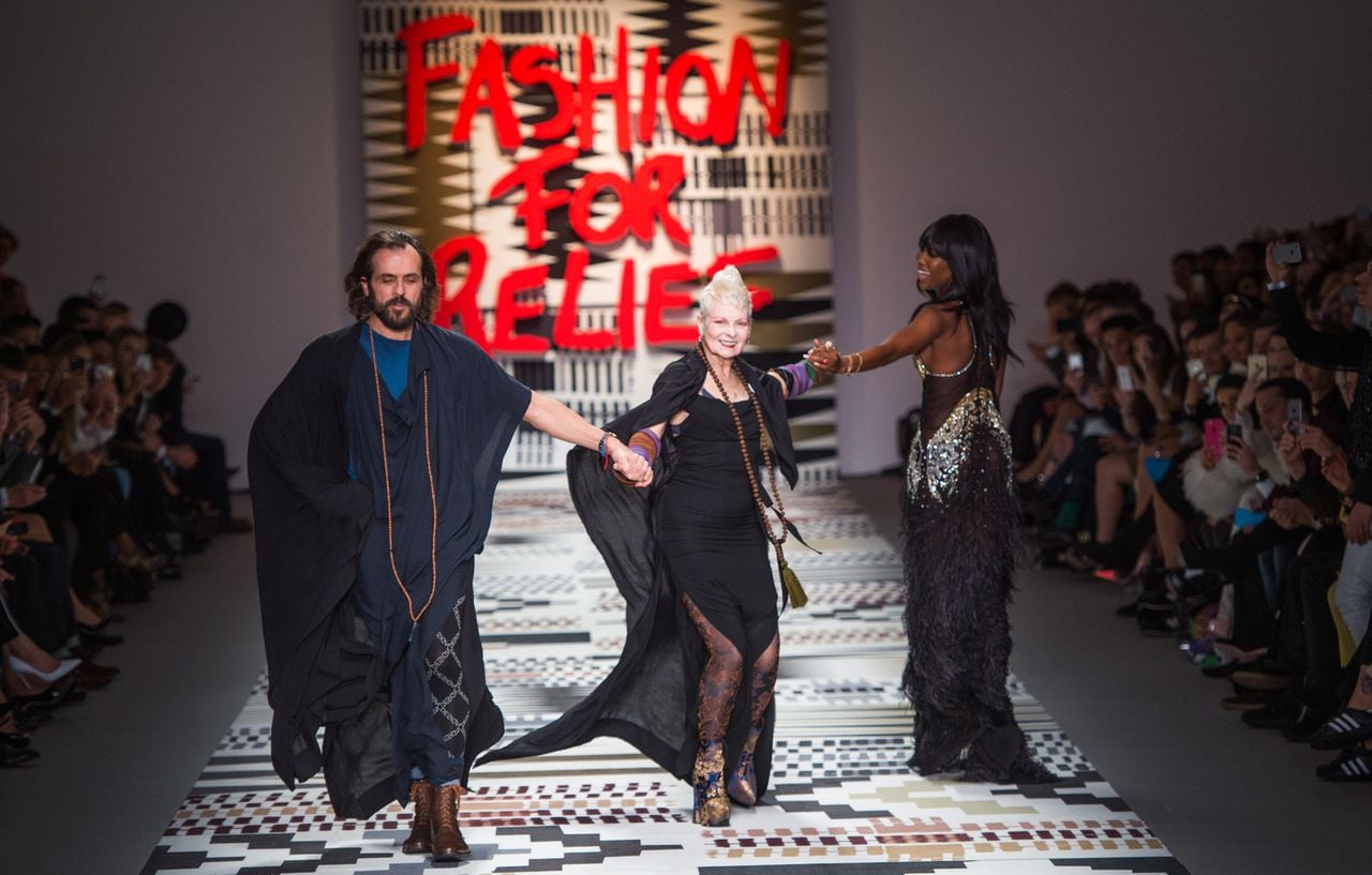 LONDON, ENGLAND - FEBRUARY 19:  Andreas Kronthaler, Dame Vivienne Westwood and Naomi Campbell walk the runway at the Fashion For Relief charity fashion show to kick off London Fashion Week Fall/Winter 2015/16 at Somerset House on February 19, 2015 in London, England.  The Fashion For Relief show is in support of Ebola, raising funds and awareness for Disaster Emergency Committee: Ebola Crisis Appeal and the Ebola Survival Fund.  (Photo by Samir Hussein/WireImage)